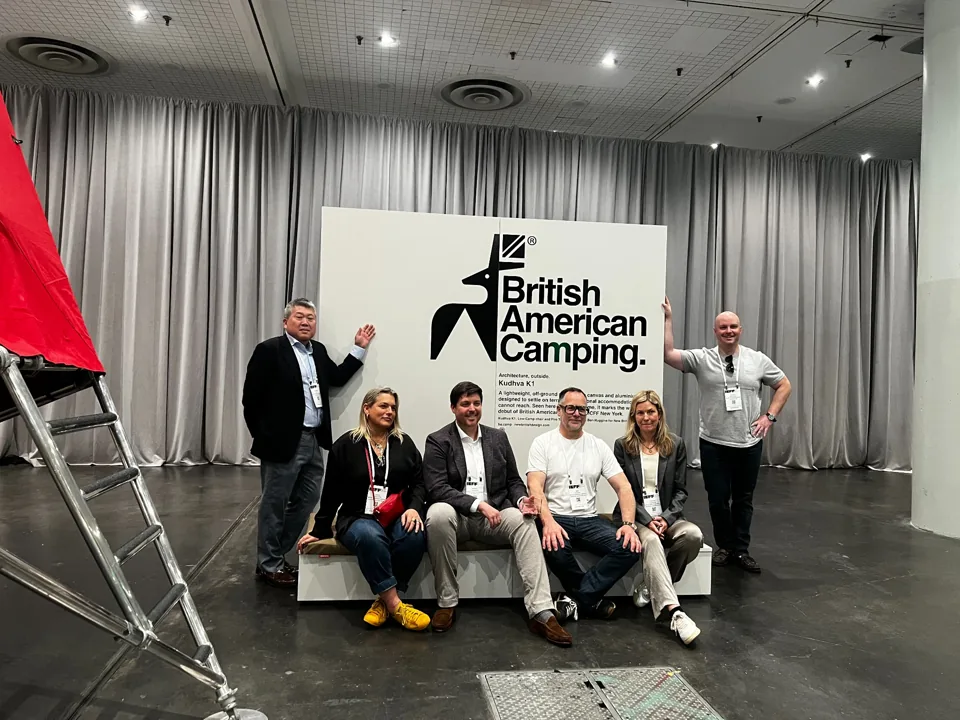 Group gathered at the British American Camping exhibit at ICFF.